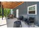 Outdoor living space with charcoal grill, dining table and chairs, and outdoor seating for entertaining at 2489 Highway 161 S Hwy, York, SC 29745