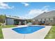 An inviting backyard pool promises relaxation and recreation with ample lounging space and lush greenery at 2489 Highway 161 S Hwy, York, SC 29745