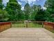 Spacious wooden deck perfect for outdoor entertaining and enjoying the peaceful backyard at 2544 Cedarwild Rd, Charlotte, NC 28212