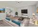 Staged living room showcases a cozy seating area, modern decor, and an inviting atmosphere at 2544 Cedarwild Rd, Charlotte, NC 28212