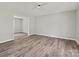 Bright and airy living room with sleek floors, neutral walls, and an open layout at 2544 Cedarwild Rd, Charlotte, NC 28212