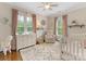 Inviting Bedroom with neutral tones, plush rug, and plenty of natural light through two windows at 3101 Auburn Ave, Charlotte, NC 28209