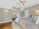 Relaxing bedroom with sloped ceilings and workspace with natural light at 3101 Auburn Ave, Charlotte, NC 28209