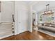 Bright dining room view with hardwood floors and stylish furniture, with access to other rooms at 3101 Auburn Ave, Charlotte, NC 28209