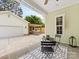 Exterior features covered patio with chairs, outdoor kitchen, and garage at 3101 Auburn Ave, Charlotte, NC 28209