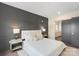 Chic bedroom with accent wall and slider to bathroom at 3630 N Davidson St # 3301, Charlotte, NC 28205