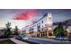 Charming modern apartment complex with appealing architectural style at dusk at 3630 N Davidson St # 3301, Charlotte, NC 28205