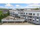 Contemporary apartment complex with balconies, a rooftop patio, and parking, offering convenient urban living at 3630 N Davidson St # 3301, Charlotte, NC 28205