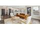 Open-concept living space with modern decor, hardwood floors, and a seamless flow to the kitchen at 3630 N Davidson St # 3301, Charlotte, NC 28205