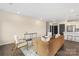 Spacious living area with modern furnishings, decor, and sleek finishes at 3630 N Davidson St # 3301, Charlotte, NC 28205