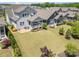 Expansive backyard featuring a covered porch, lush lawn, and inviting patio area, creating a private outdoor oasis at 376 Sensibility Cir # 8, Fort Mill, SC 29708