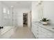 Modern bathroom featuring a glass shower, dual vanity, walk-in closet, and classic black and white tile at 376 Sensibility Cir # 8, Fort Mill, SC 29708