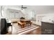 Charming dining area with a farmhouse-style table, a piano, and built-in bench seating at 376 Sensibility Cir # 8, Fort Mill, SC 29708