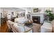 Comfortable living room featuring a fireplace and an open view into the dining room area at 376 Sensibility Cir # 8, Fort Mill, SC 29708