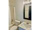 Bright bathroom featuring a tub with shower, toilet, and vanity sink at 3776 Kennedy Rd, Gastonia, NC 28056