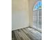 Bedroom featuring wood-look floors and large window at 3776 Kennedy Rd, Gastonia, NC 28056