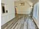 Spacious living room with tall ceilings, wood-look floors, and modern trim at 3776 Kennedy Rd, Gastonia, NC 28056