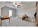 Bonus room with vaulted ceiling, ceiling fan, window, and comfortable seating area at 397 Fischer Rd, Fort Mill, SC 29715