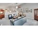 Inviting living room with vaulted ceilings, a ceiling fan, and cozy seating arrangements at 397 Fischer Rd, Fort Mill, SC 29715