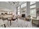 Elegant living room featuring an open layout with a fireplace and seamless flow to the kitchen at 397 Fischer Rd, Fort Mill, SC 29715