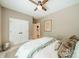 This bedroom features a ceiling fan, a double closet, and an ensuite bathroom at 4033 Weddington Manor Ct, Matthews, NC 28104