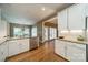 Bright kitchen featuring granite countertops, stainless steel dishwasher, and backyard view at 4033 Weddington Manor Ct, Matthews, NC 28104