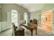 Bright office featuring arched windows, shutters, and a classic wooden desk at 4033 Weddington Manor Ct, Matthews, NC 28104
