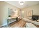 Home office with wood flooring, neutral decor and bright recessed lighting at 4033 Weddington Manor Ct, Matthews, NC 28104