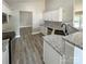 Well-designed kitchen featuring white cabinets, granite countertops, and modern appliances at 4049 Fincher Rd # 3, Matthews, NC 28104