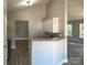 Bright kitchen featuring white cabinets, granite countertops, and modern finishes at 4049 Fincher Rd # 3, Matthews, NC 28104
