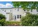 Rear exterior with patio and grassy area, showcasing the home's outdoor space at 4132 Kenton Glenn Nw Ct, Concord, NC 28027