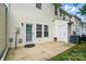 Home rear exterior with patio area, perfect for enjoying the outdoors at 4132 Kenton Glenn Nw Ct, Concord, NC 28027