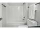 Bathroom featuring white shower-tub with chrome faucet at 4132 Kenton Glenn Nw Ct, Concord, NC 28027