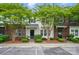 Beautiful townhome exterior with fresh landscaping and convenient parking at 4132 Kenton Glenn Nw Ct, Concord, NC 28027