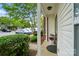 Cozy front porch with a lovely view and charming curb appeal at 4132 Kenton Glenn Nw Ct, Concord, NC 28027