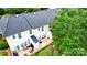 Aerial view of a townhome with a private patio and well-maintained backyard at 4132 Kenton Glenn Nw Ct, Concord, NC 28027