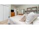 Cozy bedroom featuring a comfortable bed, neutral tones, and closet, perfect for relaxation at 4405 Sugar Cane Ct, Waxhaw, NC 28173