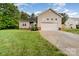 Charming home with a two-car garage, well-maintained lawn, and welcoming curb appeal at 4405 Sugar Cane Ct, Waxhaw, NC 28173