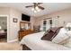 Relaxing bedroom featuring a plush bed, wooden dresser, and ample natural light at 4405 Sugar Cane Ct, Waxhaw, NC 28173
