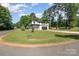 Well-maintained modern home with lush green lawn and mature trees at 4608 Rockwood Dr, Waxhaw, NC 28173