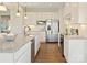 Spacious kitchen with granite countertops, stainless steel appliances, and ample storage space at 511 Lenswood Ct, Denver, NC 28037