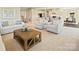 Inviting living room with plush seating, a cozy atmosphere, and an open floor plan at 511 Lenswood Ct, Denver, NC 28037