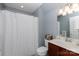 Bathroom featuring a sink, toilet, vanity, and shower with a curtain at 52538 Winchester St, Fort Mill, SC 29707