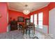 Bright dining area with modern chandelier and adjacent access to the kitchen and living spaces at 52538 Winchester St, Fort Mill, SC 29707