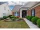 Well-maintained front yard with lush landscaping and charming curb appeal at 52538 Winchester St, Fort Mill, SC 29707