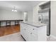 Bright eat-in kitchen boasts granite countertops, stainless steel appliances, and an island with extra storage at 606 Deer Creek Dr, Matthews, NC 28105