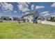The backyard is spacious with a lush green lawn, perfect for relaxation and recreation at 6176 Russo Ct, Lancaster, SC 29720