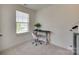 Bright bedroom featuring a cozy desk area by a window, perfect for a home office at 6176 Russo Ct, Lancaster, SC 29720