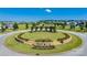 A warm welcome to Walnut Creek neighborhood with attractive landscaping and signage at 6176 Russo Ct, Lancaster, SC 29720