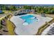 Aerial view of the community pool and pool house with lap lanes, play area, and zero entry at 6176 Russo Ct, Lancaster, SC 29720